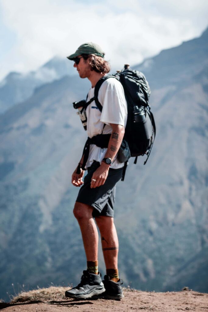 Hiker with camera accessories