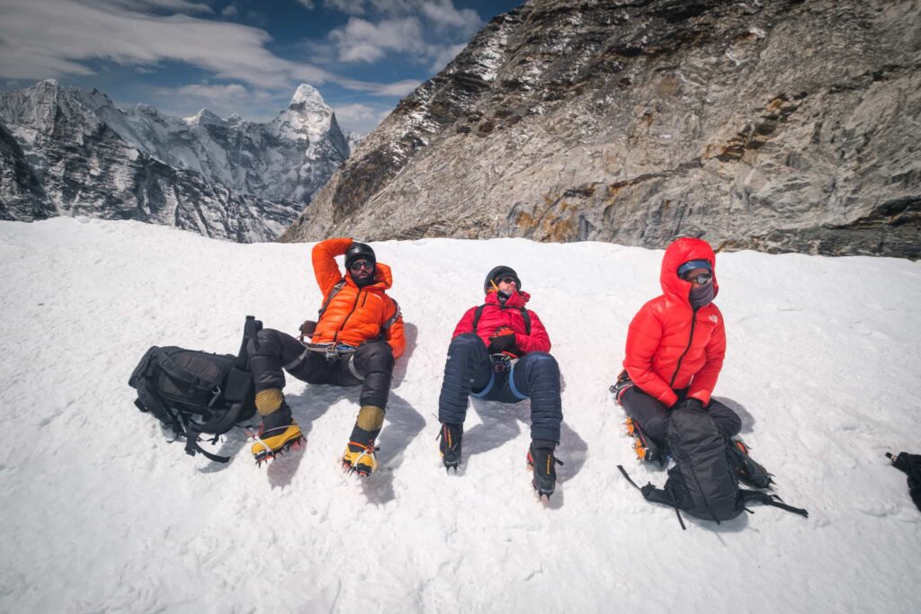 Adventurers wearing mountaineering boots in the mountains
