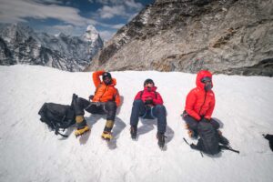 Adventurers wearing mountaineering boots in the mountains
