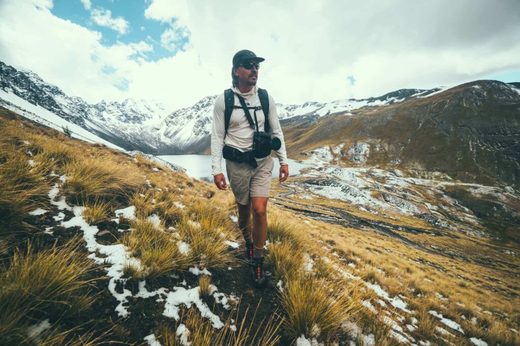 Man hiking with a camera