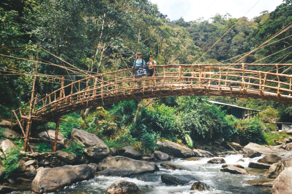 Hikers posing on a bridge in PNG