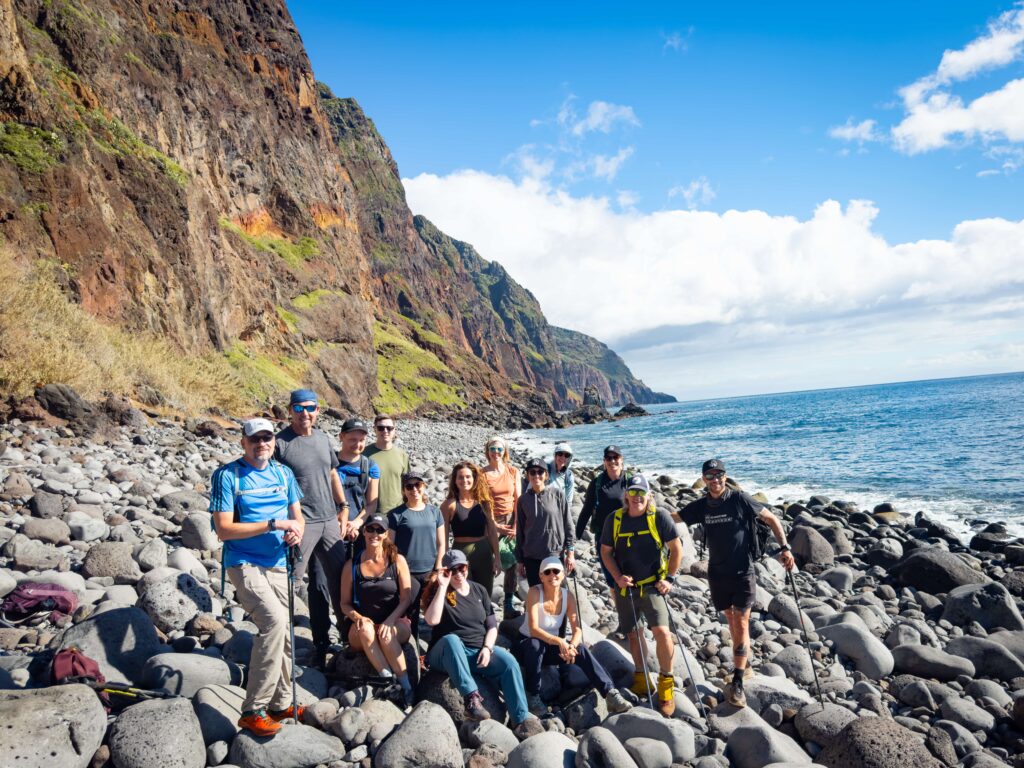 Travelers on a rocky beach in Madeira